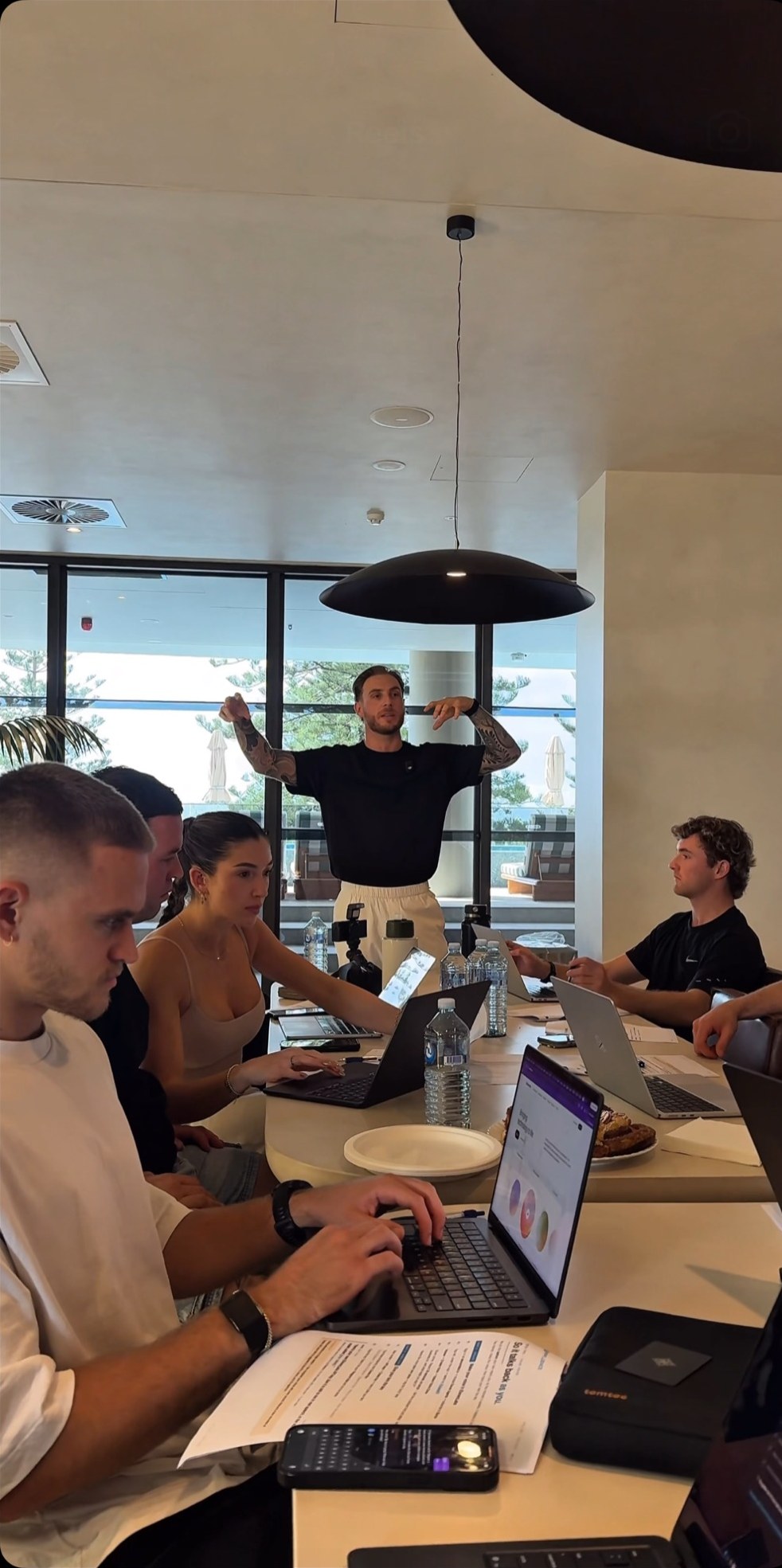 Owners building with their laptops inside an Appfluence workshop